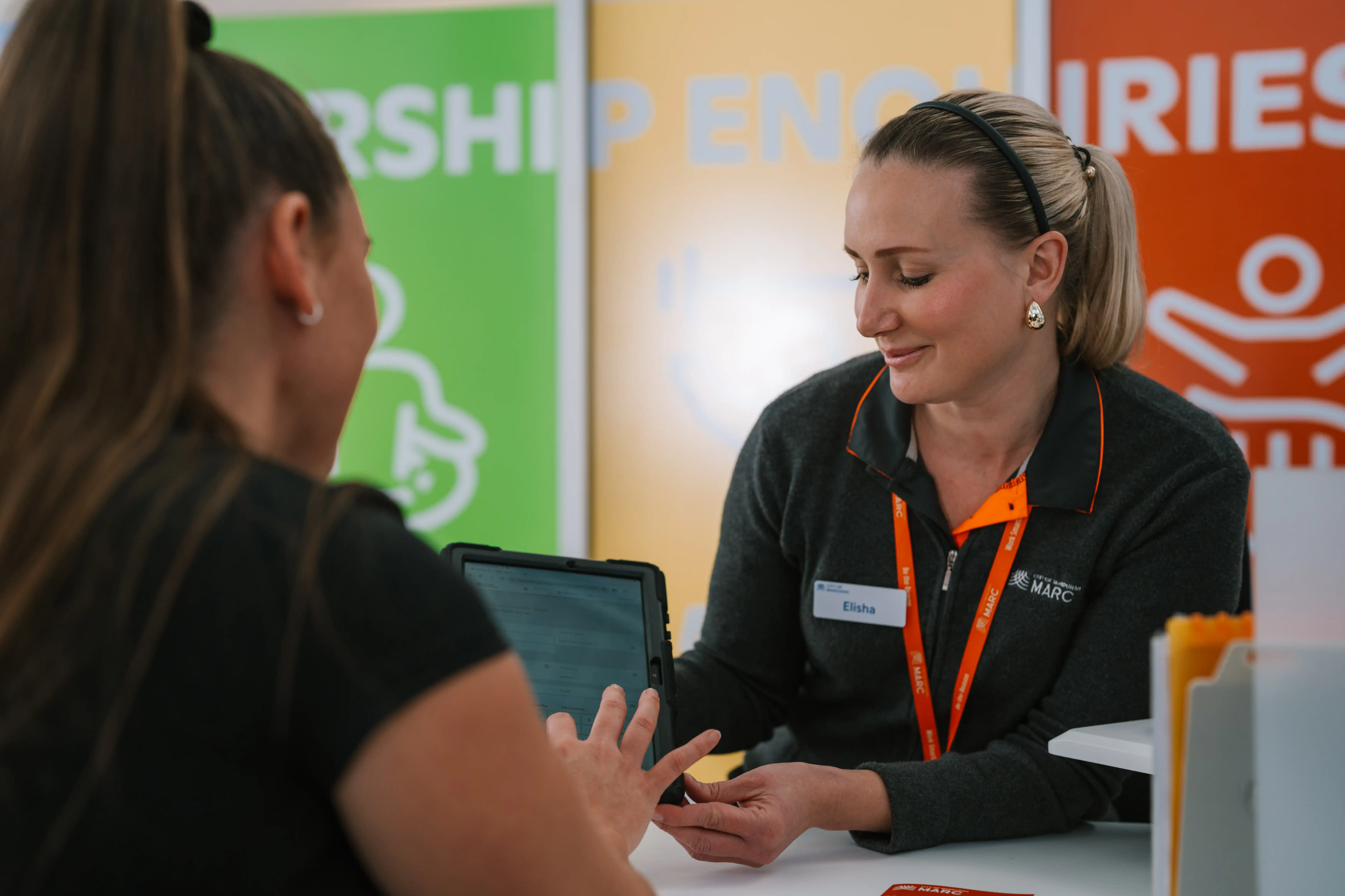 Customer service assisting customer.